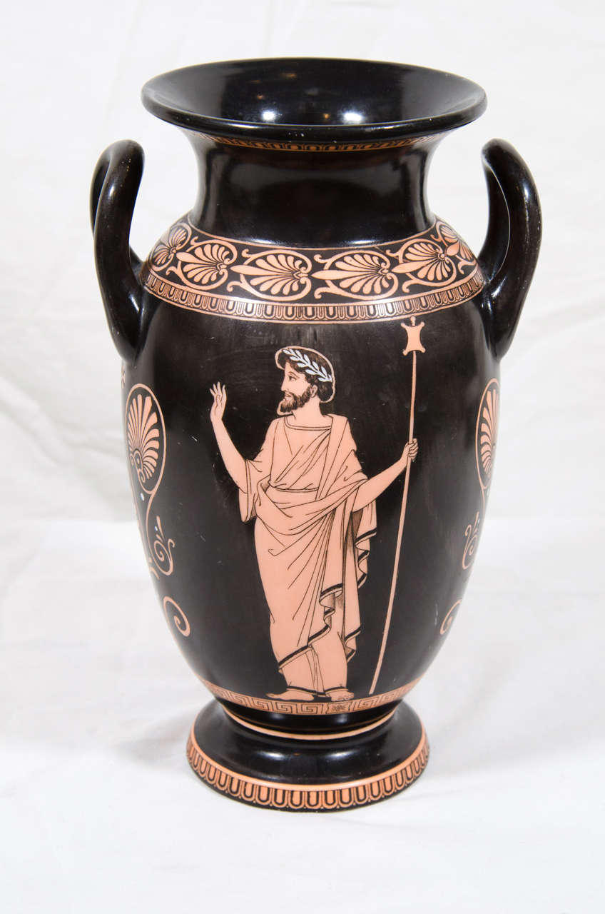 A 19th century neoclassical Attic style porcelain vase with mythological figures. The vase shows Triptolemos who often appeared in Athenian vase painting. He was the demi-god of the harvest shown here seated in his winged chariot drawn by serpents.