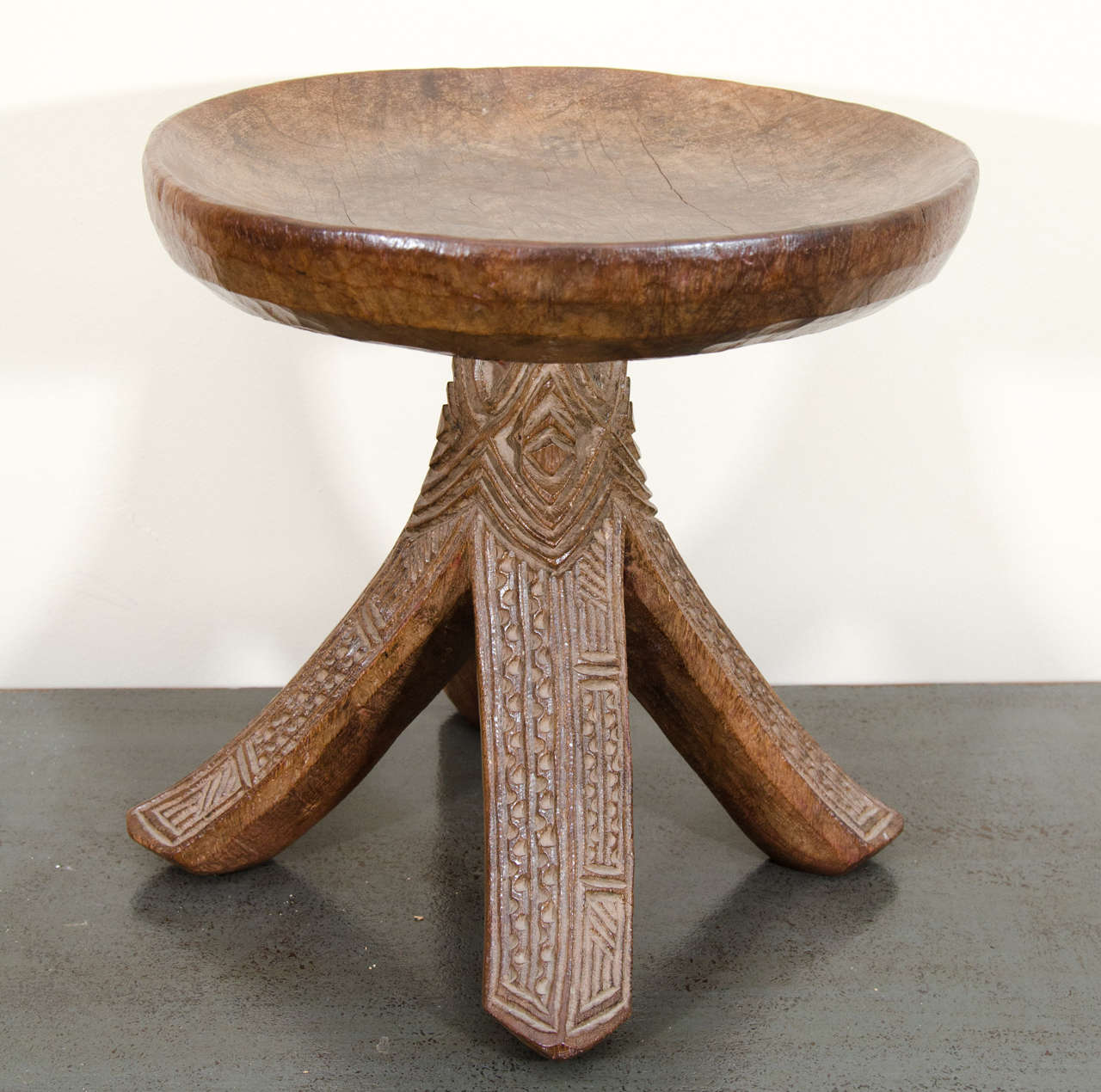 A magnificent Igbo wooden stool from Nigeria.

The Igbo homeland occupies a broad area of present day central Nigeria, north of the Niger River Delta. The Igbo People trace their origins to the region’s earliest hunters and gathers, who settled
