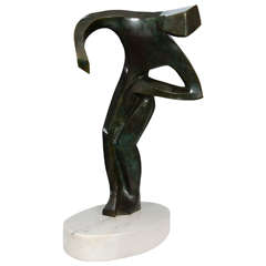 Stylized Bronze Figural Sculpture on White Marble Base