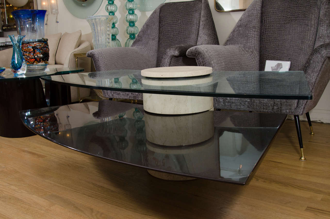 Adjustable, bi-level modern coffee table composed of travertine, wood and glass.