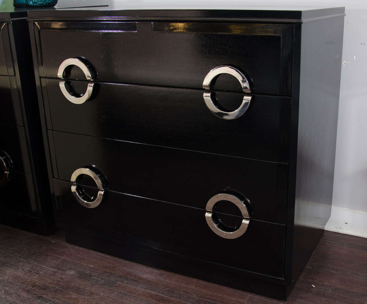 Pair of ebonized and nickel dressers in the manner of James Mont.