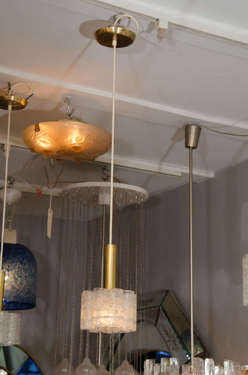 Doria style pendants with brass hardware (three are available).