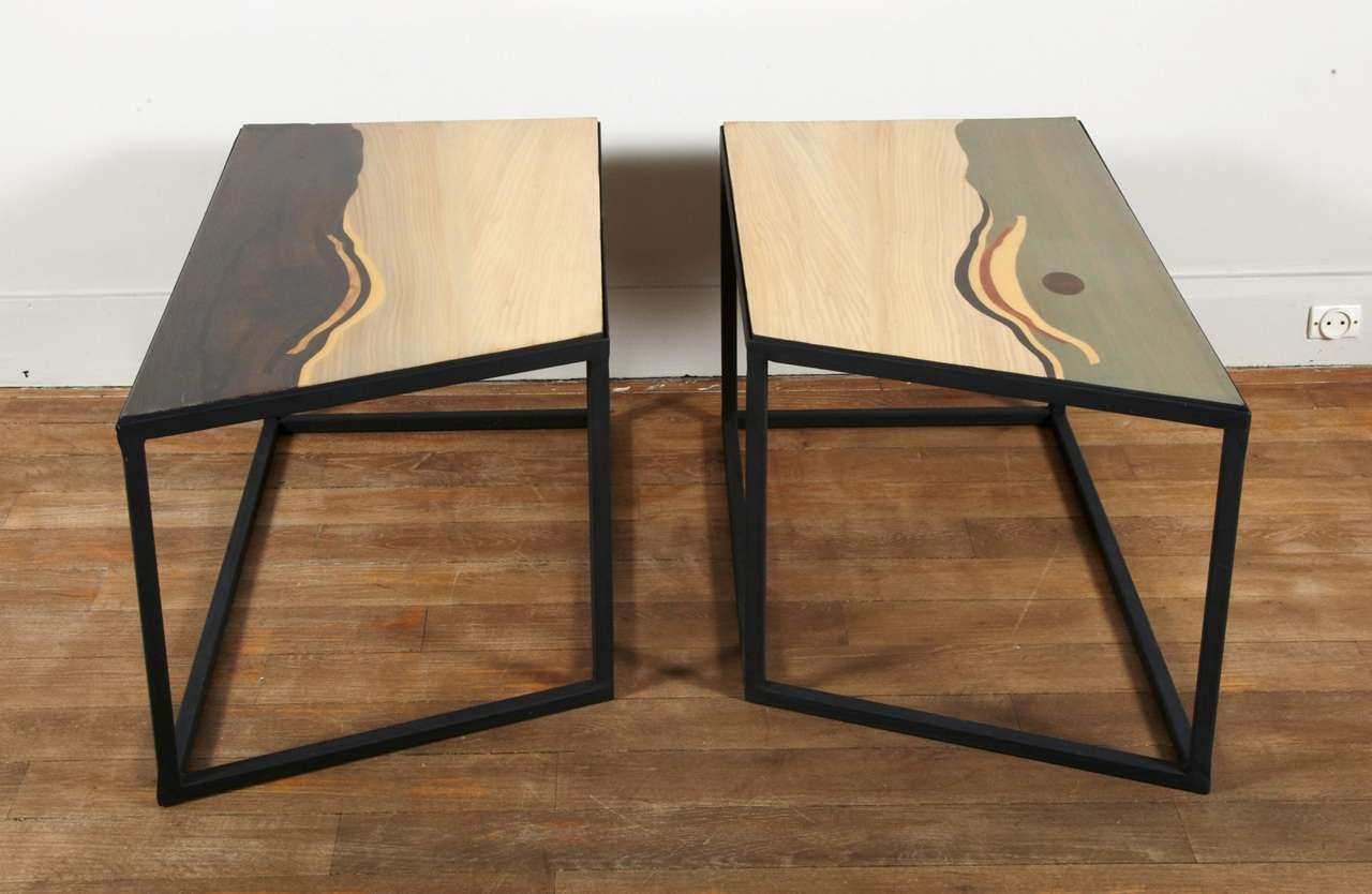 Mid-Century Modern An Unusual Pair Of End  Tables Displaying Wood Veneered Tops