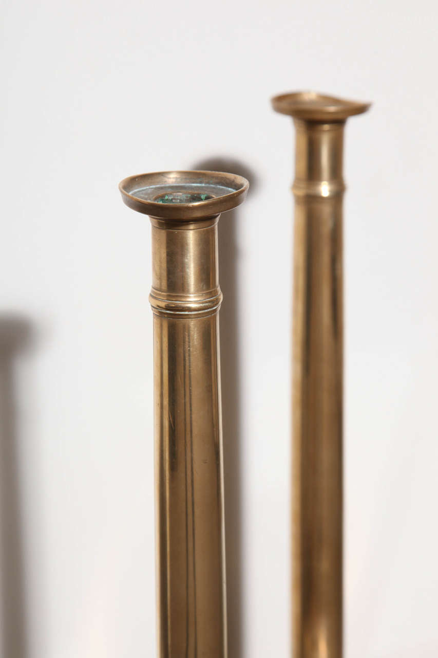 Pair of Tall Brass Candlesticks In Fair Condition For Sale In New York, NY