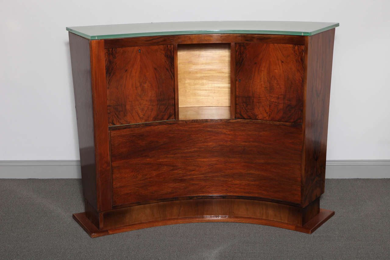 Beautiful palisander curved free standing bar, with leather panel at front and original glass top.