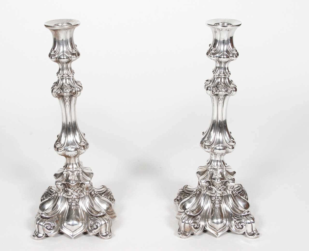 Pair of antique silver plate candlesticks from the early 1900s.