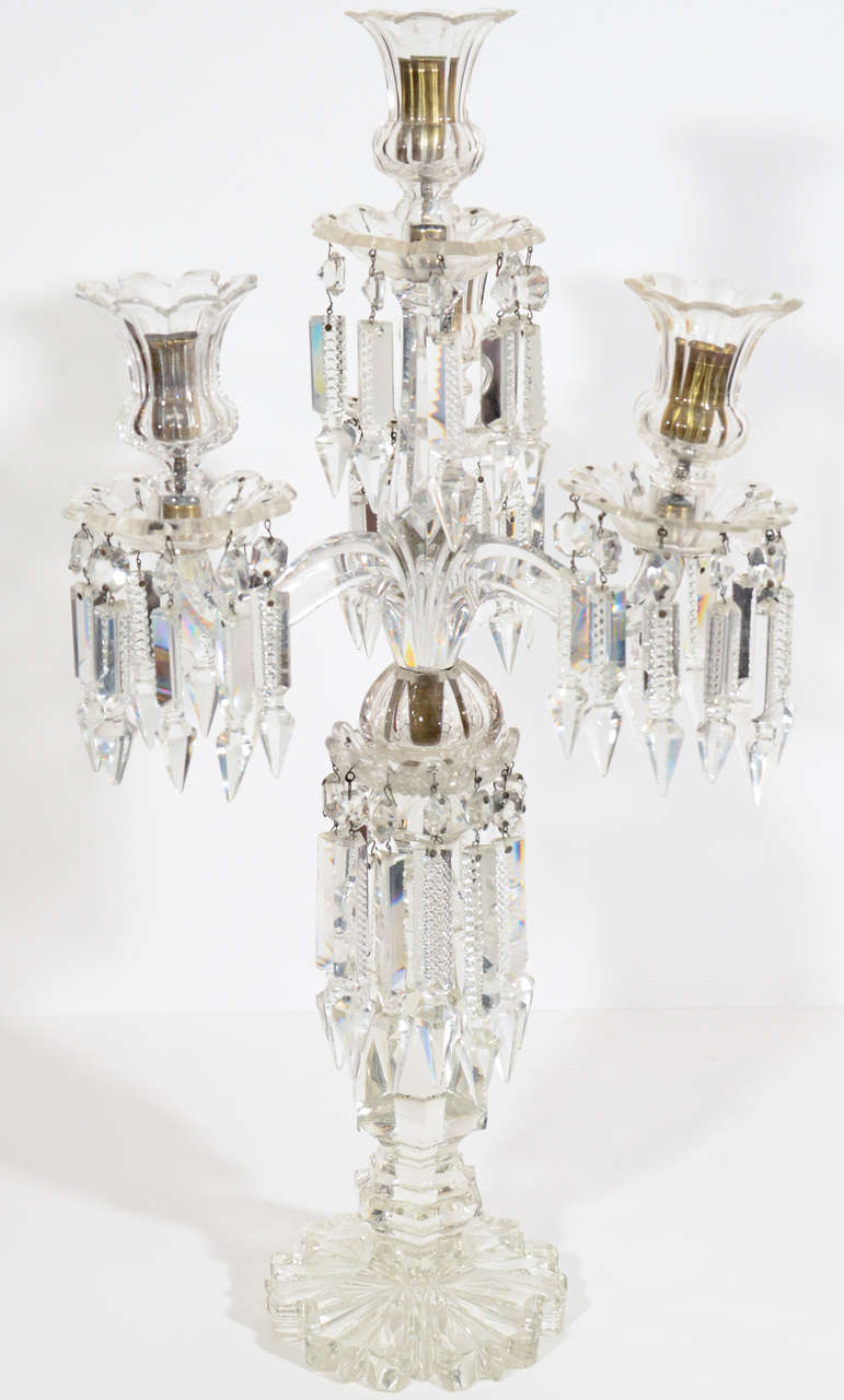 A stunning pair of Baccarat Crystal Candelabras. Please also inquire about our other Baccarat, Murano, or Waterford pieces. This can be seen at our 5 East 16th St. store at Union Square in Manhattan.