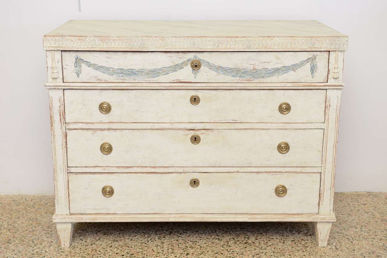 Very pretty unusual antique commode with painted marble top.
Upper section of the first drawer has a decorative painted garlandsin blue. Similarly, the top drawer with various compartments