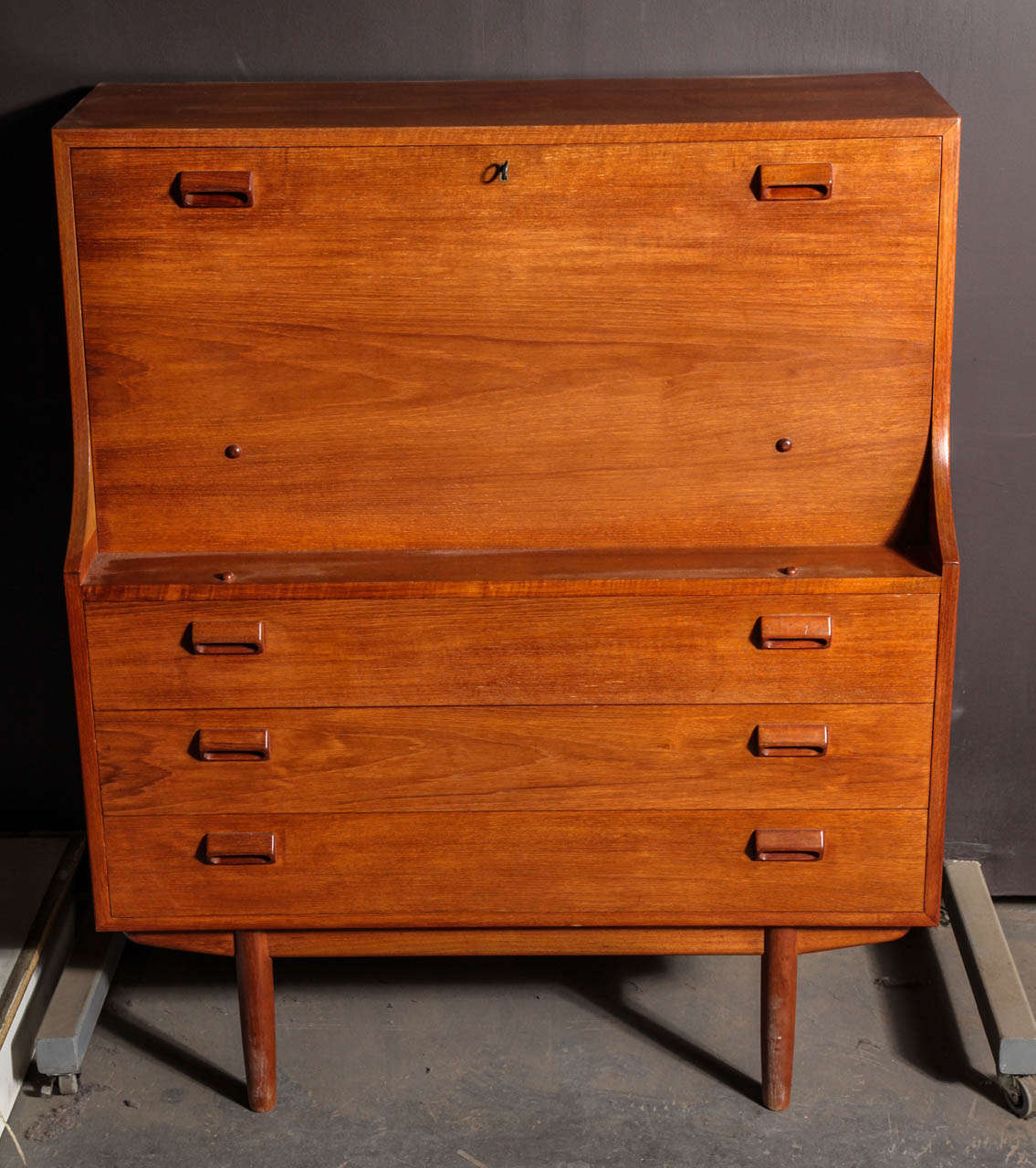 Vintage 1950s Borge Mogensen Teak Secretary.

This Vintage Secretary Desk is in like new condition. A great storage for your laptop computer, and extra storage drawers for anything from dinnerware to clothing. This secretary is in like-new