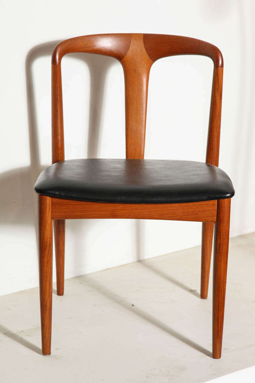 Vintage 1960s Danish Dining Chairs by Johannes Andersen.

These Vintage Dining Chairs are in amazing condition are very comfortable. Leather is in great condition, but can be reupholstered to fit your tastes.