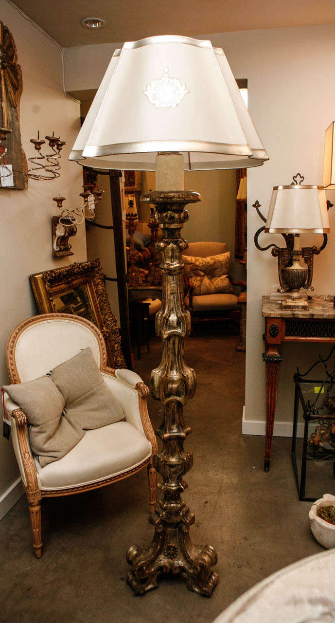 18th cent. Italian Baroque style floor lamp,
carved and silver gilded with detail on the bottom