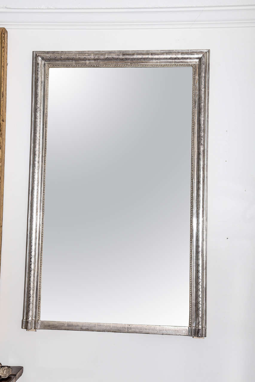 19th C. French Silver leaf rectangular mirror with pearls surrounding the interior perimeter and X design sketched on silver.