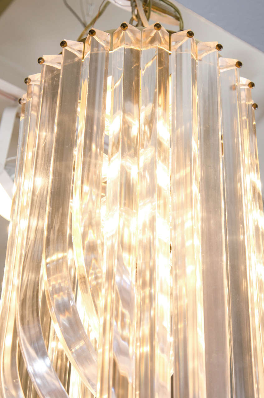 Brass Midcentury Long Looped Lucite Chandelier