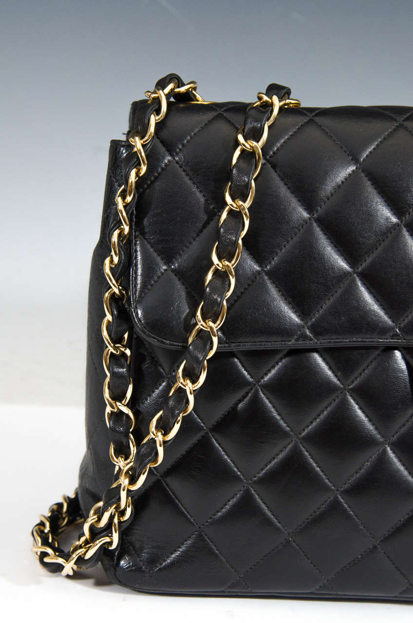 Authentic Chanel Black Classic Lambskin Maxi Handbag with Gold Tone Hardware 2