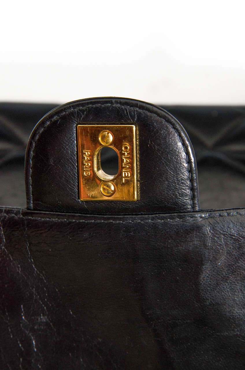 20th Century Authentic Chanel Black Classic Lambskin Maxi Handbag with Gold Tone Hardware