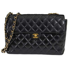 Vintage Authentic Chanel Black Classic Lambskin Maxi Handbag with Gold Tone Hardware