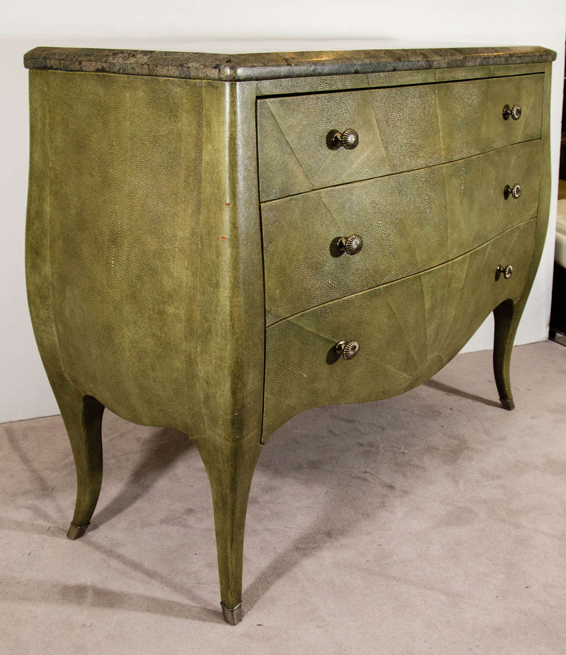 A vintage shagreen three-drawer Bogart Collection bombe chest or commode with pieced marble veneer top by Thomasville. Retains its original label. Good condition with age appropriate wear and patina. A few dings to sides and edges of chest and a