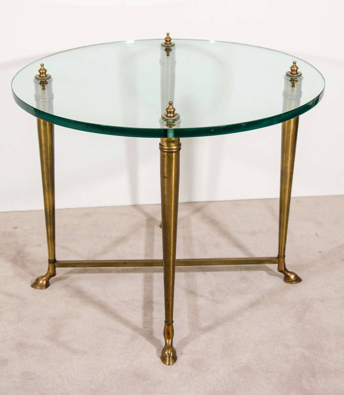 Vintage Maison Jansen style brass and glass side or end table with four finials detailing the 1