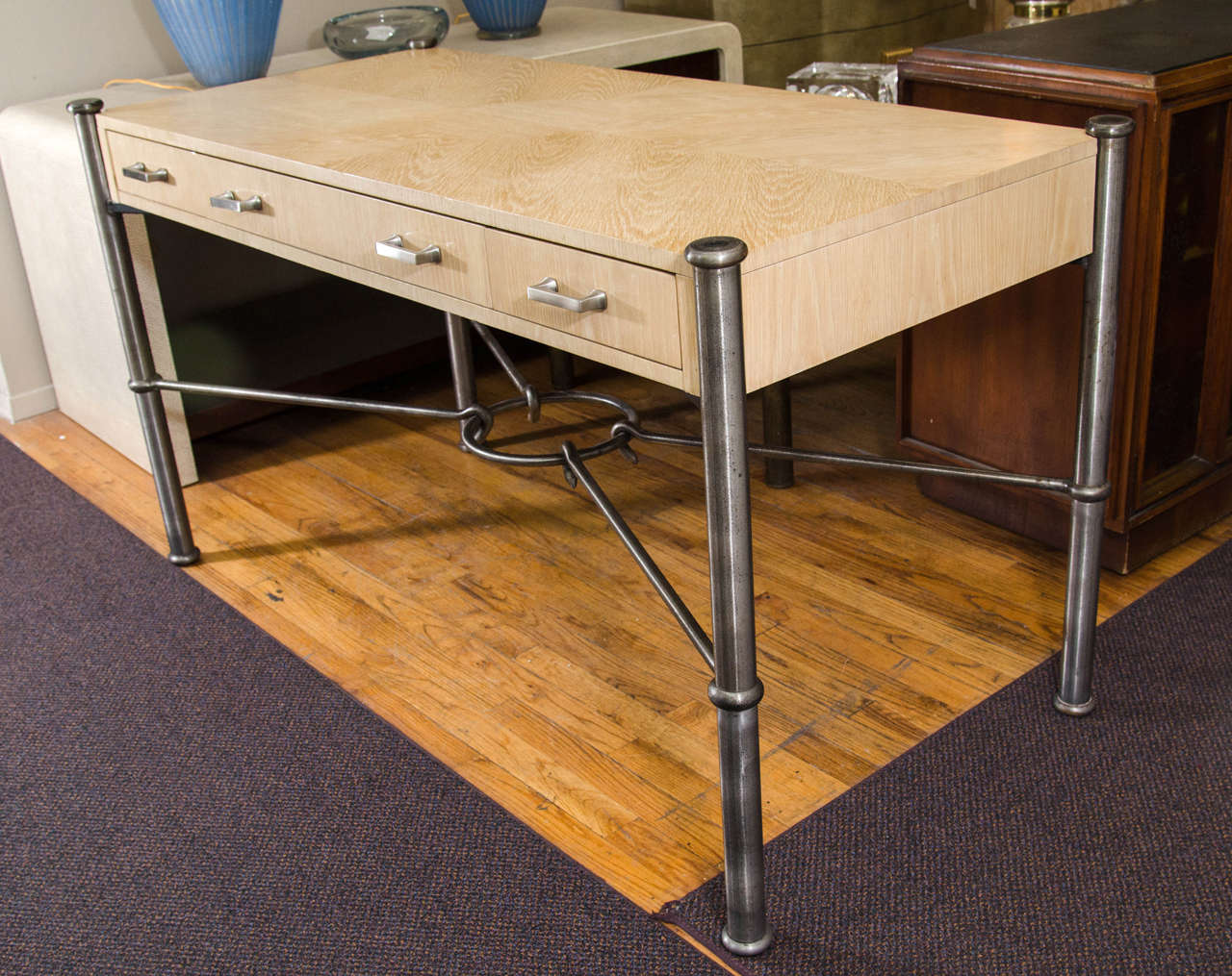 A vintage desk or console table in solid oak with oak veneer design on top, steel frame, and chrome hardware by Jay Spectre for Century. The piece retains its original label. Good vintage condition with age appropriate wear and patina.