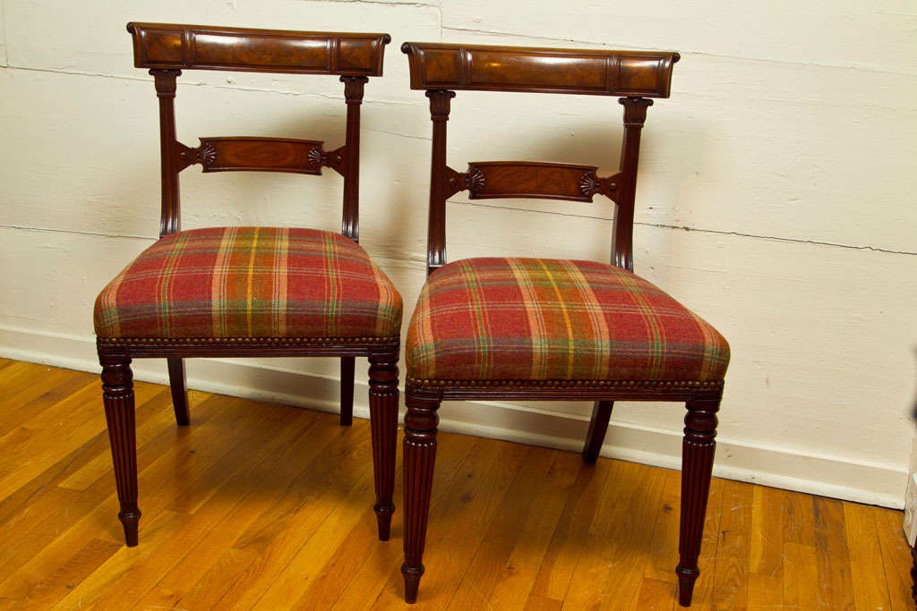 A wonderful set of English Regency dining chairs, very fine quality, detailed carving and excellent condition.