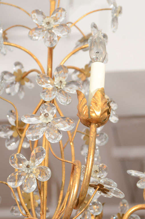 A Pair Of Gilt Metal And Crystal Chandeliers In Excellent Condition In New York, NY