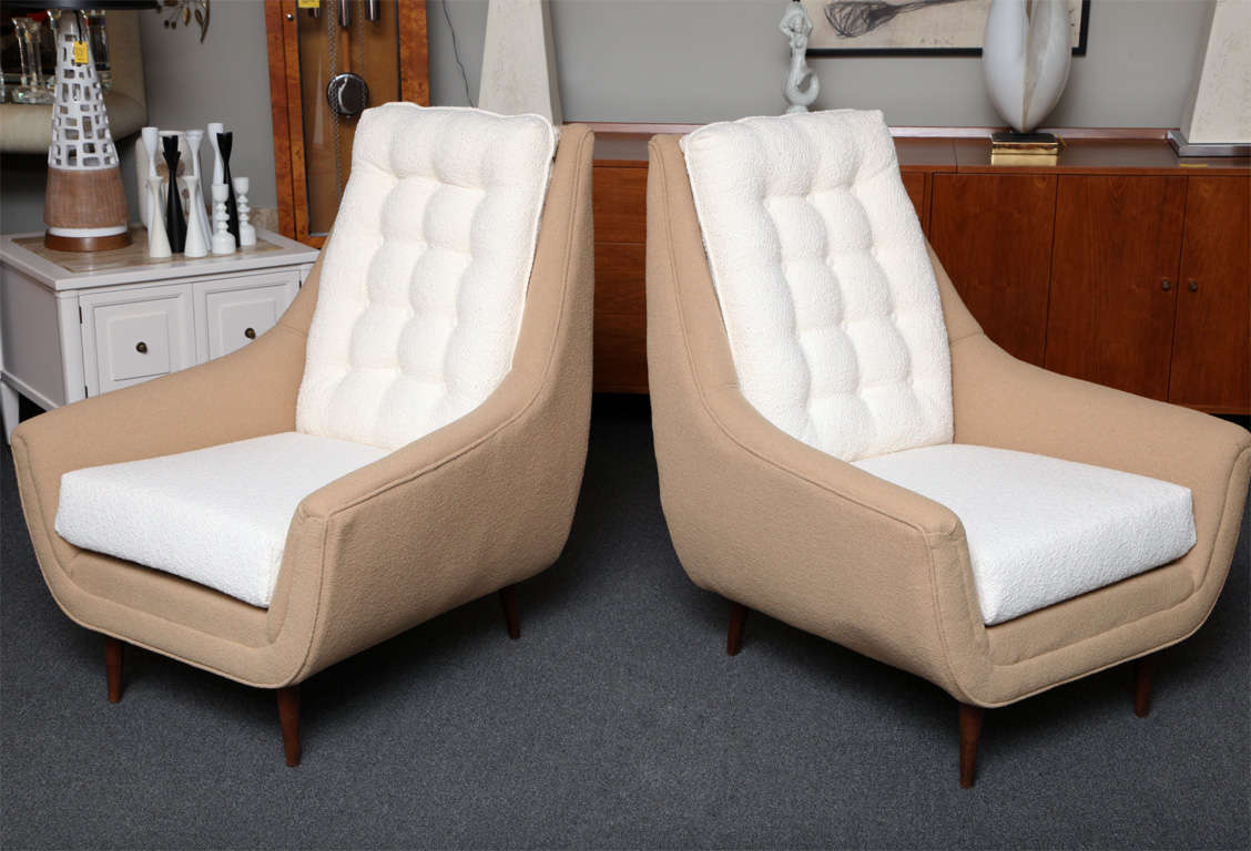 SOLD MAY 2012 Trim, tailored and striking, this matching pair of 50's tufted back lounge chairs and ottoman from Bassett are room anchors freshly upholstered in cream and café con leche toned boucle fabrics.  High backed and striking, they stand on