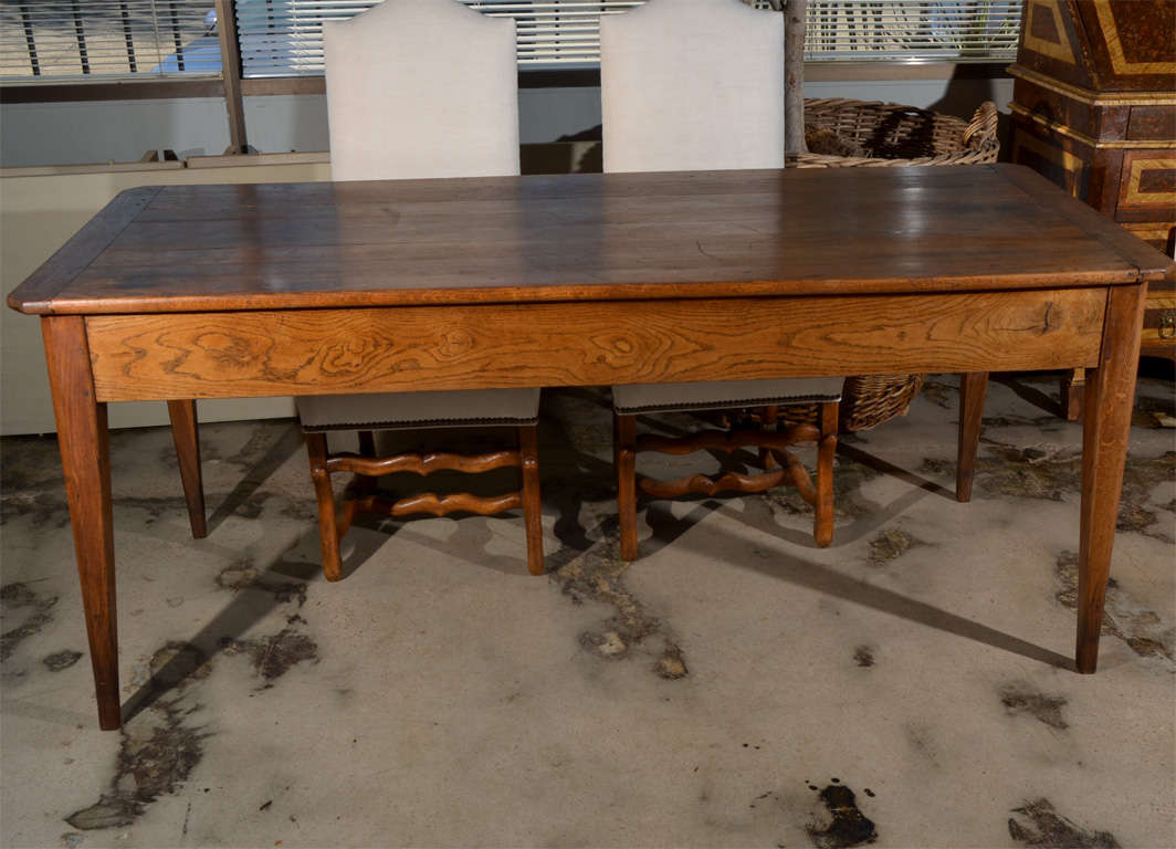 French farm table with drawers at both ends, chamfored corners and legs, dough board ends