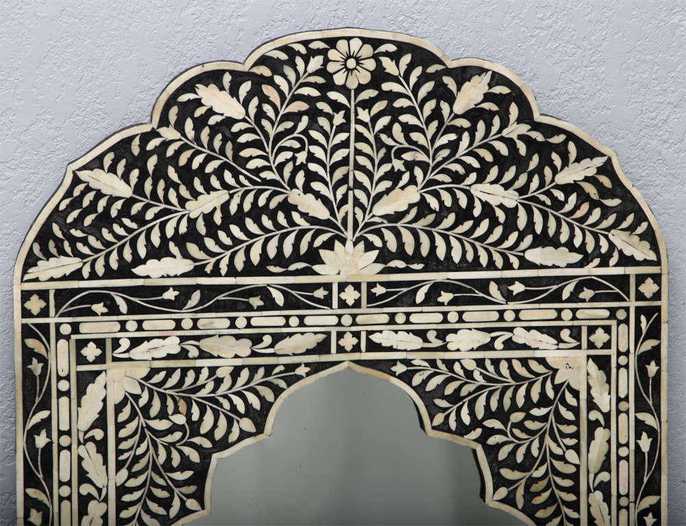 Large-scaled Moroccan mirror with intricate bone inlays has a very modern, graphic, black-and-white boldness we love!