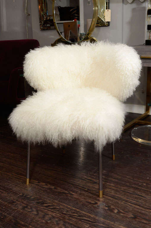 Custom Mongolian fur chair with polished nickel legs. Customization is available in different sizes, finishes and colors.