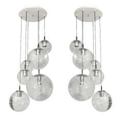 Pair of 1970
s RAAK Clear Globe Fixtures Pair of 1970
s RAAK Clear Globe Fixtures