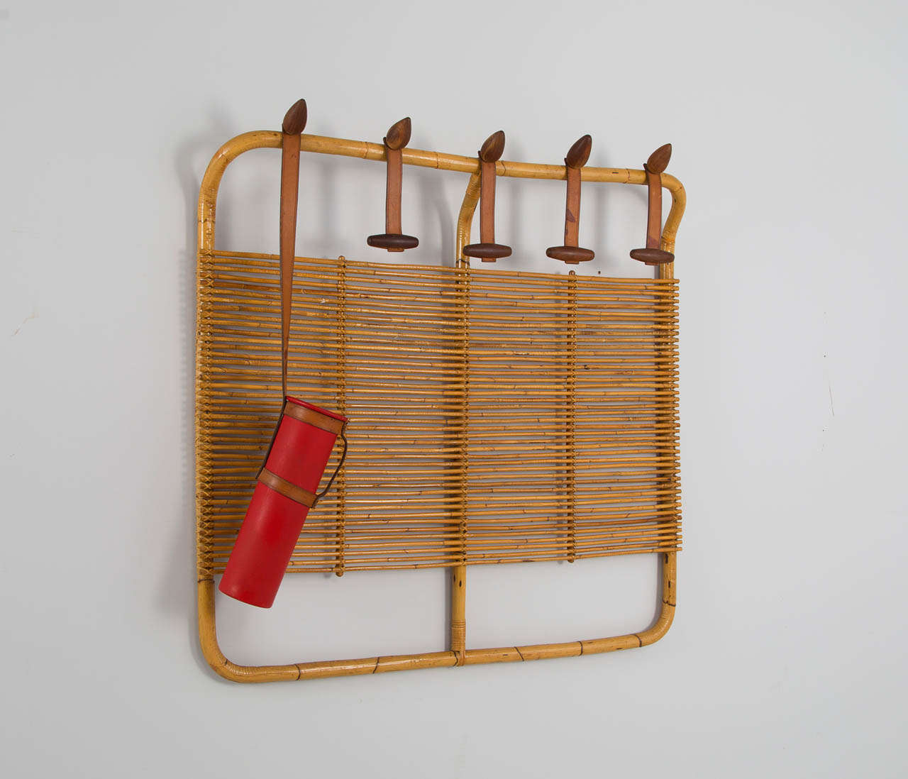 Coat rack, in bamboo by Vittorio Bonacina, Italy, 1970s. 

A beautiful clothing / hat rack in bamboo with leather hangers and small wooden pegs, complete with umbrella holder. 
Vittorio Bonacina is well known for his skill and craftmanship in