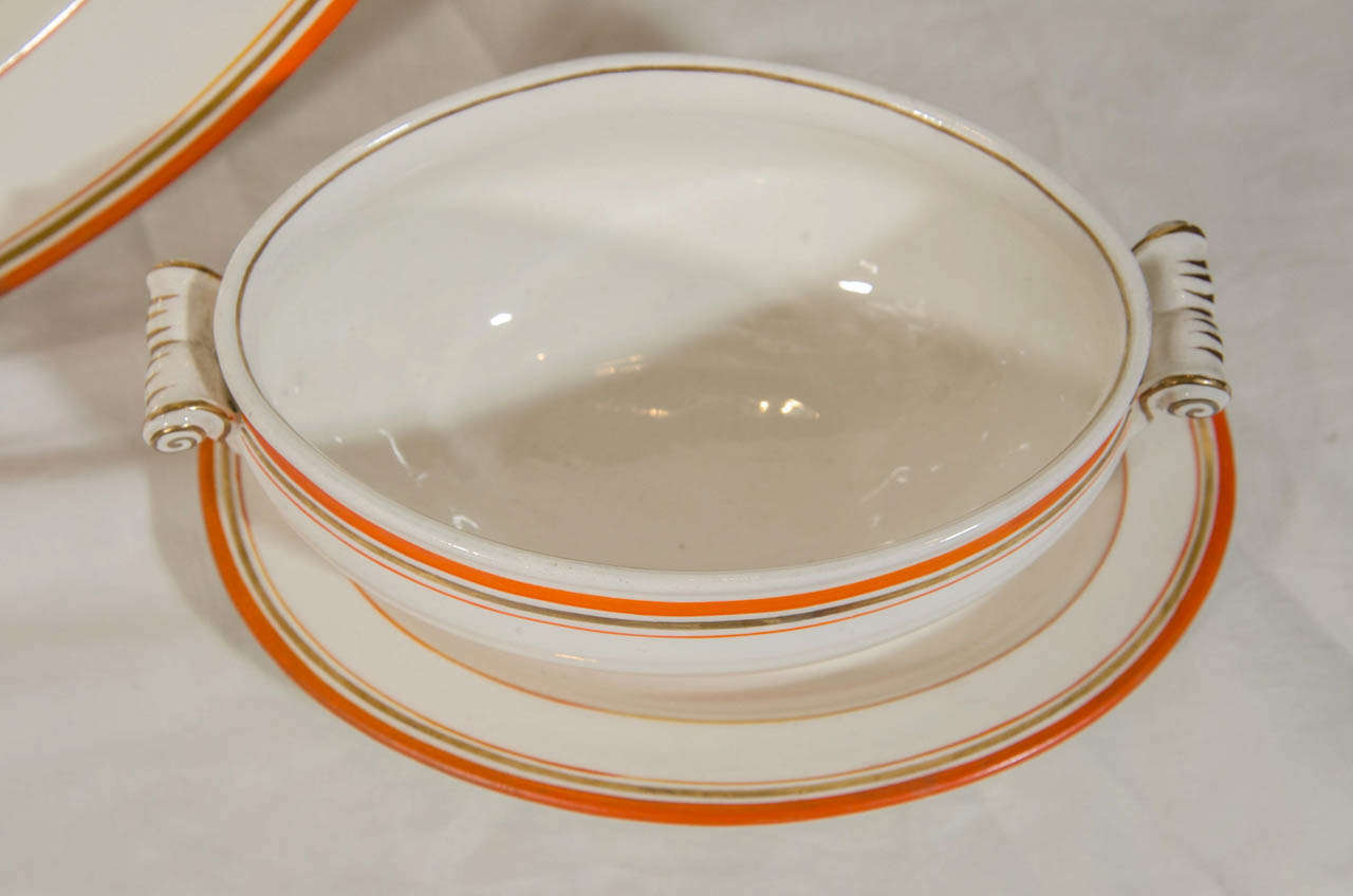 Wedgwood Group of Platters, Dishes and Tureens with Orange and Gilt Borders 1