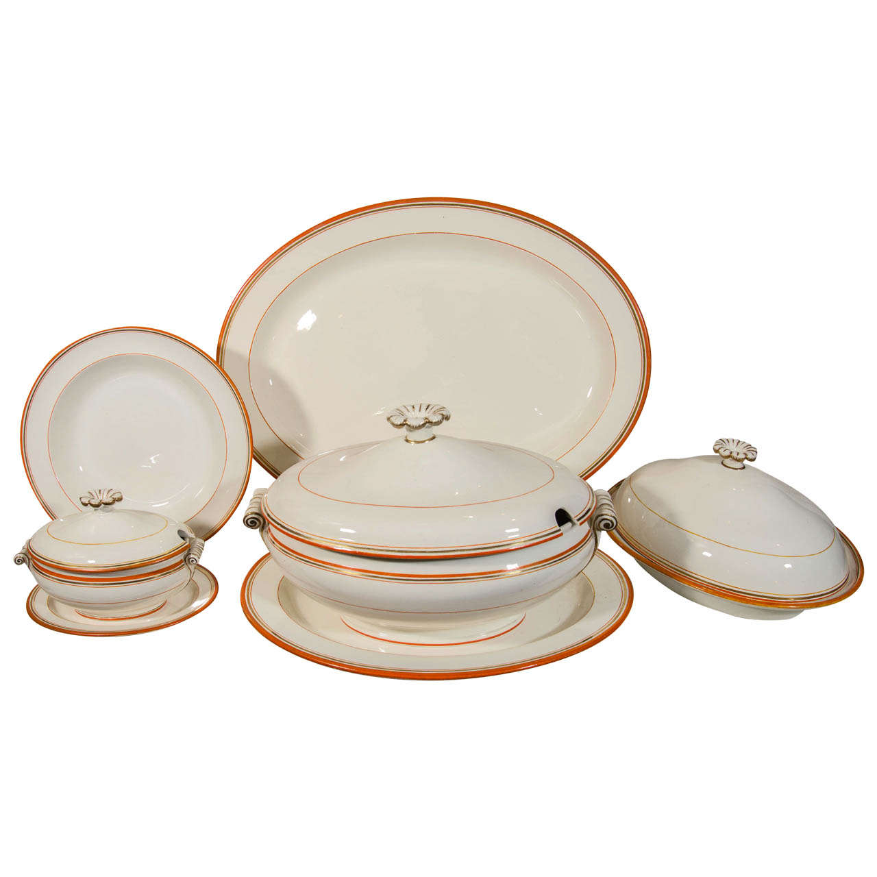 Wedgwood Group of Platters, Dishes and Tureens with Orange and Gilt Borders