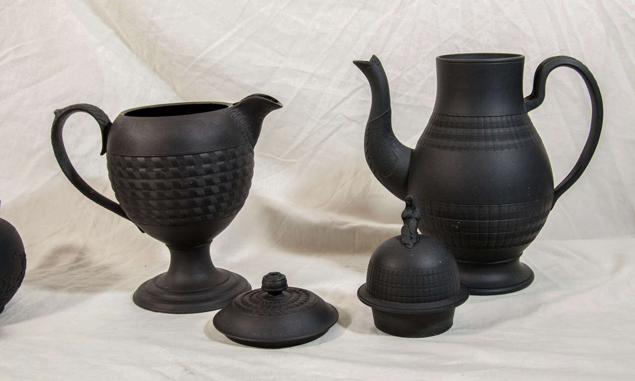 A Collection of Black Basalt Tea and Coffee Pots 1