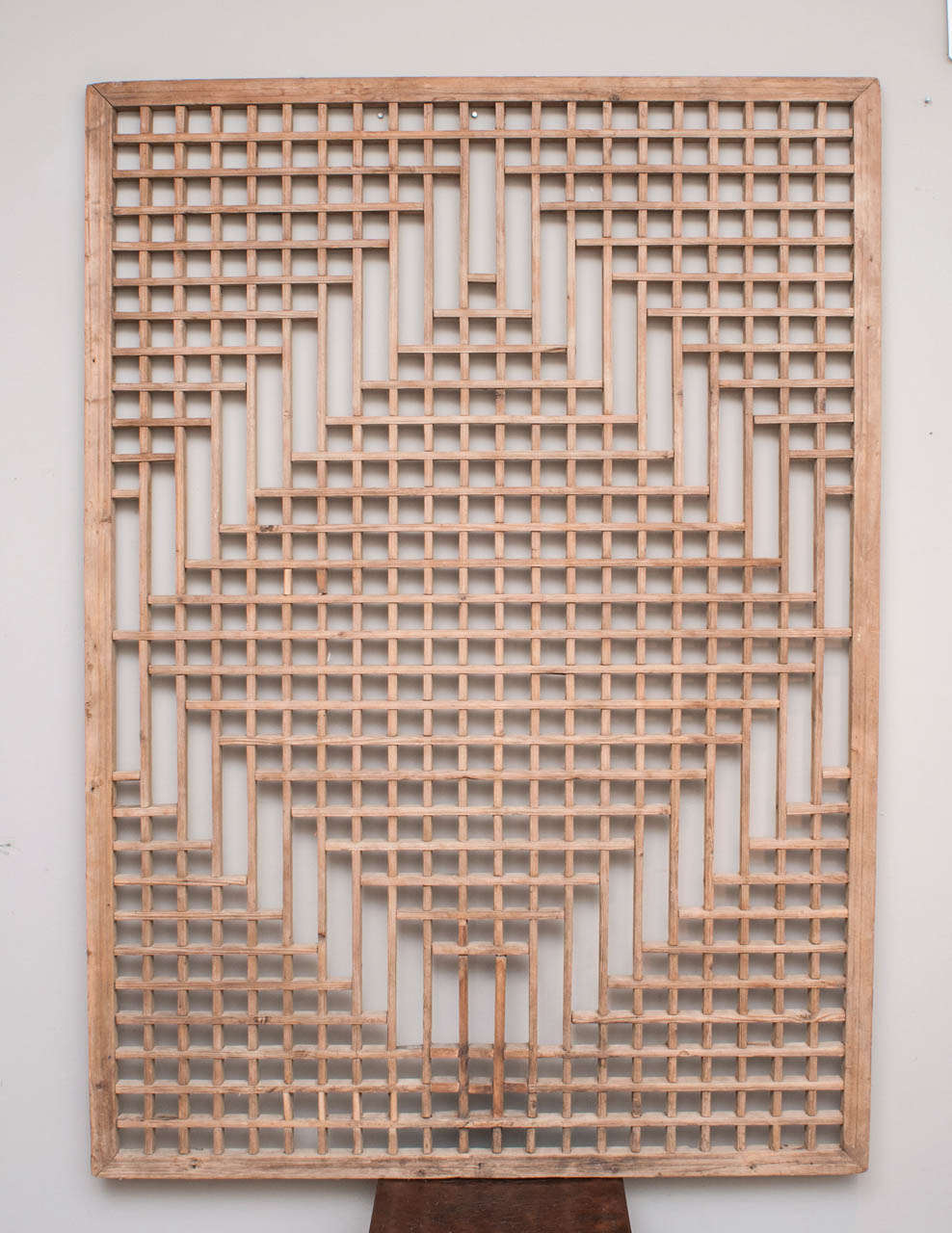 Chinese lattice window panel of minimal geometric design crafted from pale, raw softwood. Stunning when mirrored backing is added.