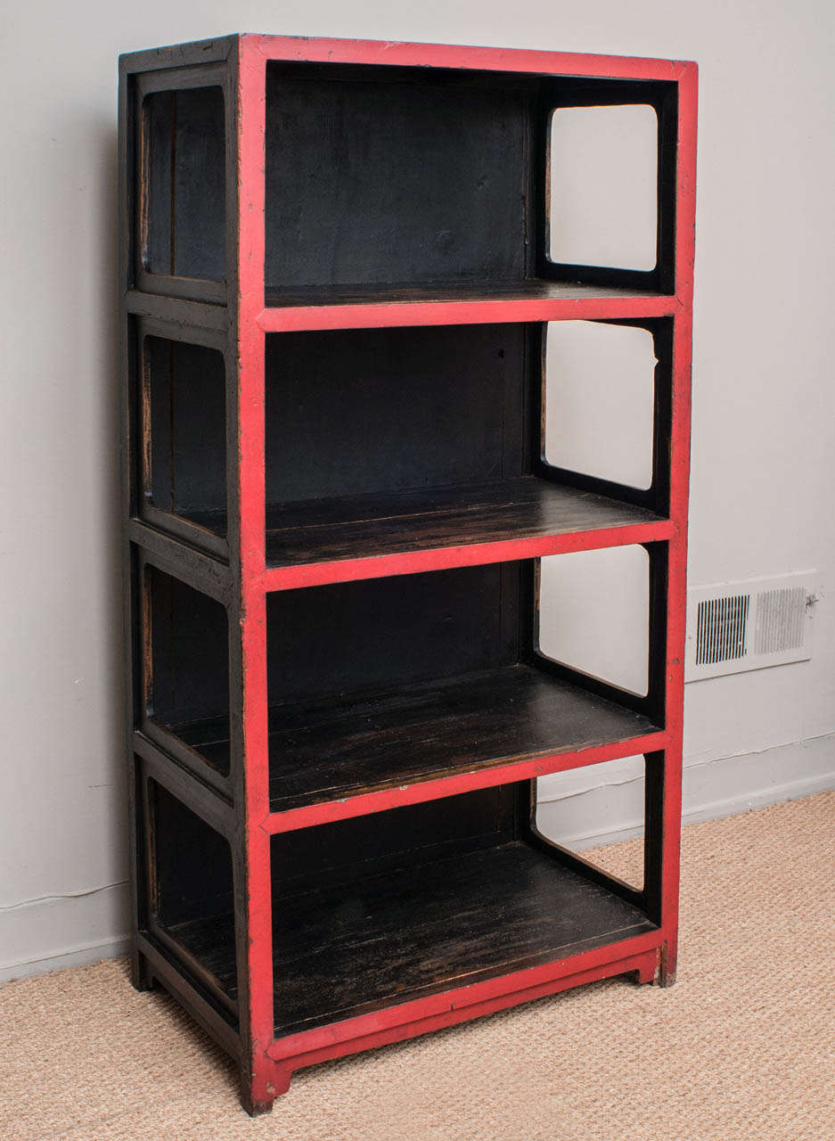 Chinese, 19th Century book/display case highlighted in black lacquer. Retains its original lacquer , handcrafted in the Shanxi Province.