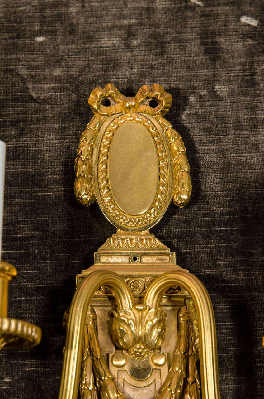 A Pair of  American Louis XVI Style Gilt Bronze Wall Sconces by E. F. Caldwell In Good Condition For Sale In New York, NY