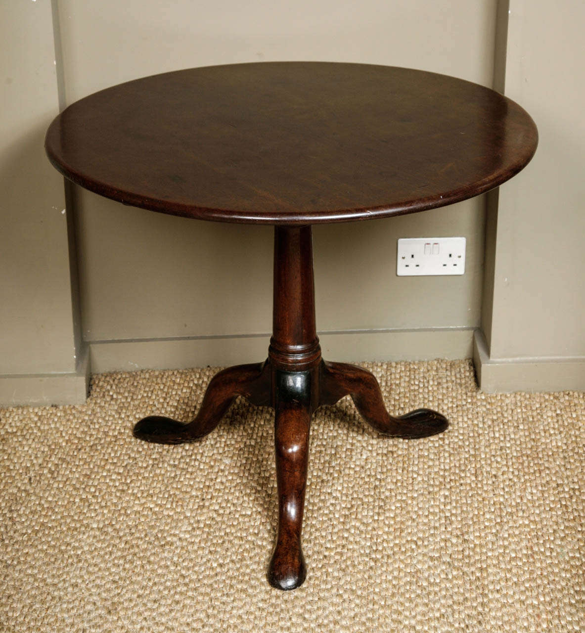 Very solid and heavy George II Cuban mahogany tripod table with 'brid cage' action tilting mechanism. Solid one piece top on revolving turned barrel birdcage and gun barrel turned pedestal, shaped cabriole legs and large flat pad feet. Nice colour