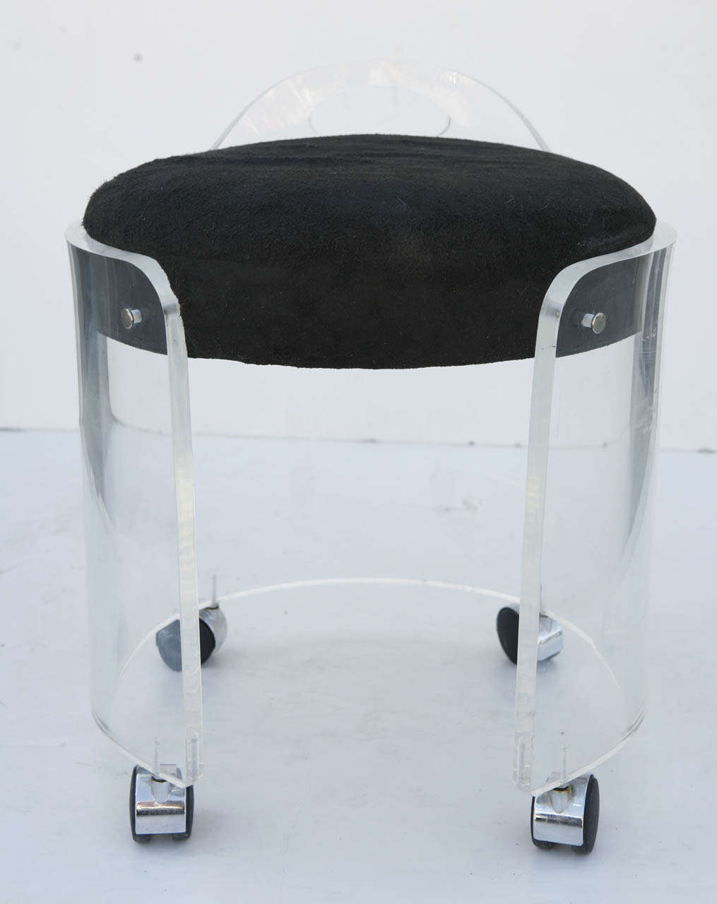 Circular lucite vanity stool with original casters by iconic designer and artist Charles Hollis Jones.
