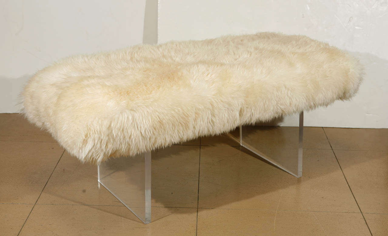 1960's lucite base bench with original sheepskin upholstery.