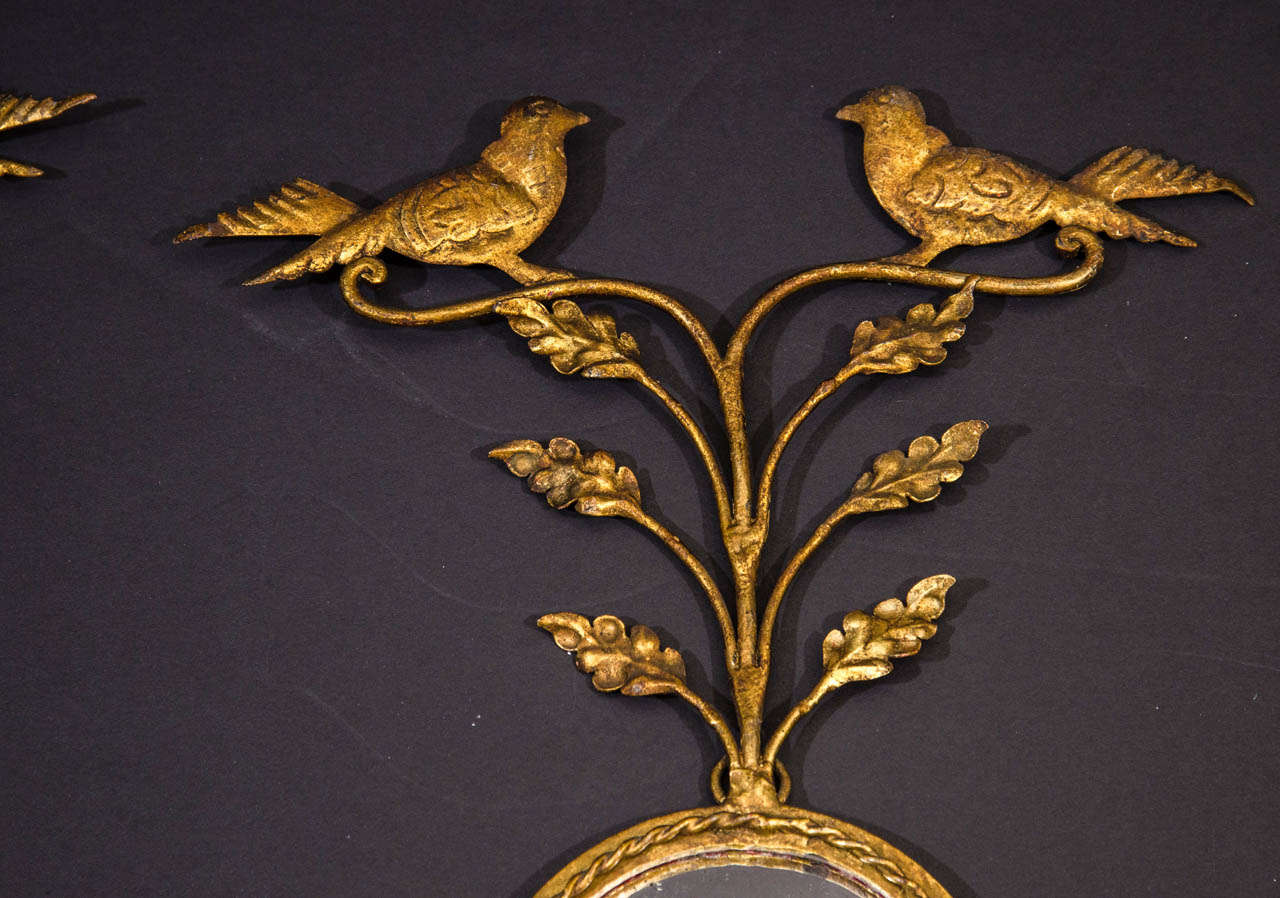 Mid-Century Modern GIlt Iron Mirrored Back Sconces with Bird and Foliage Motif For Sale