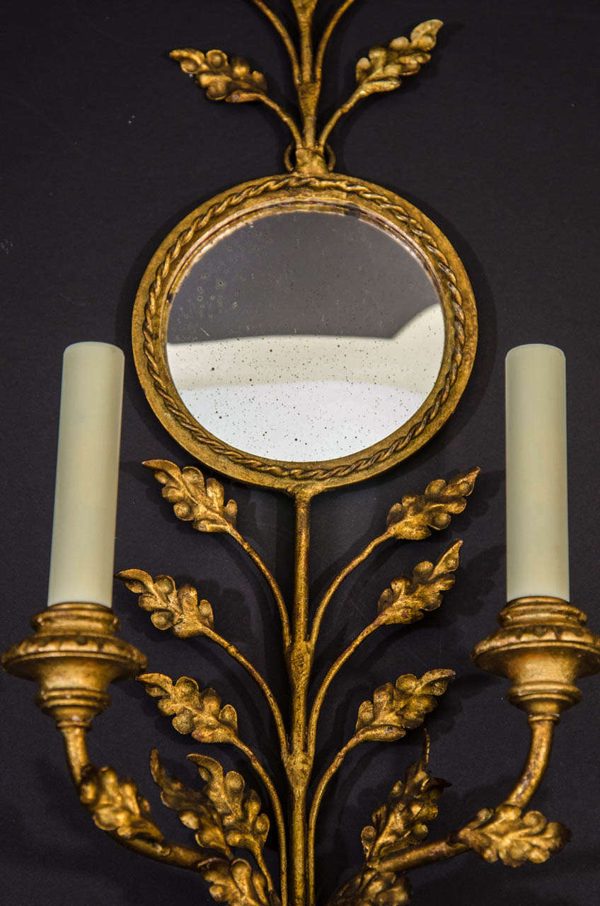 Italian GIlt Iron Mirrored Back Sconces with Bird and Foliage Motif For Sale