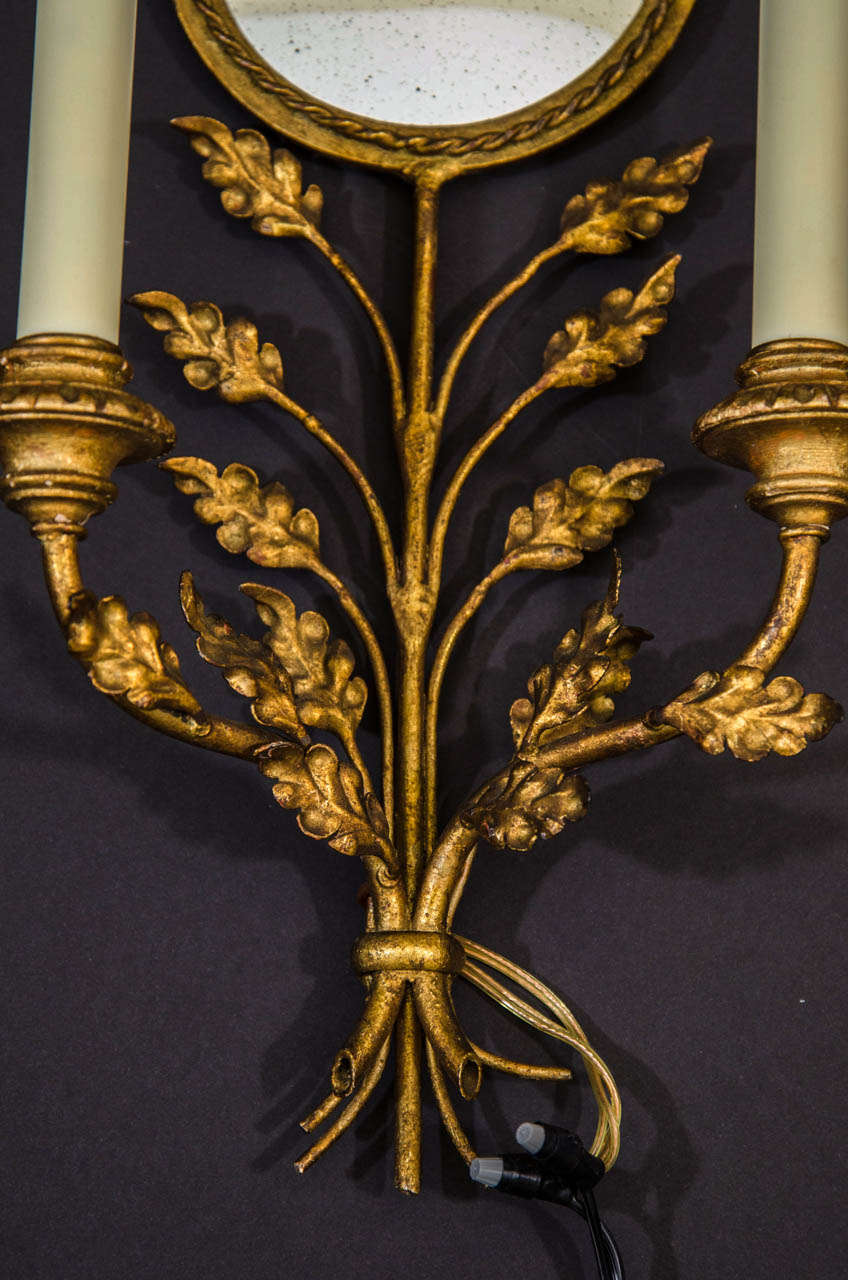 Mid-20th Century GIlt Iron Mirrored Back Sconces with Bird and Foliage Motif For Sale