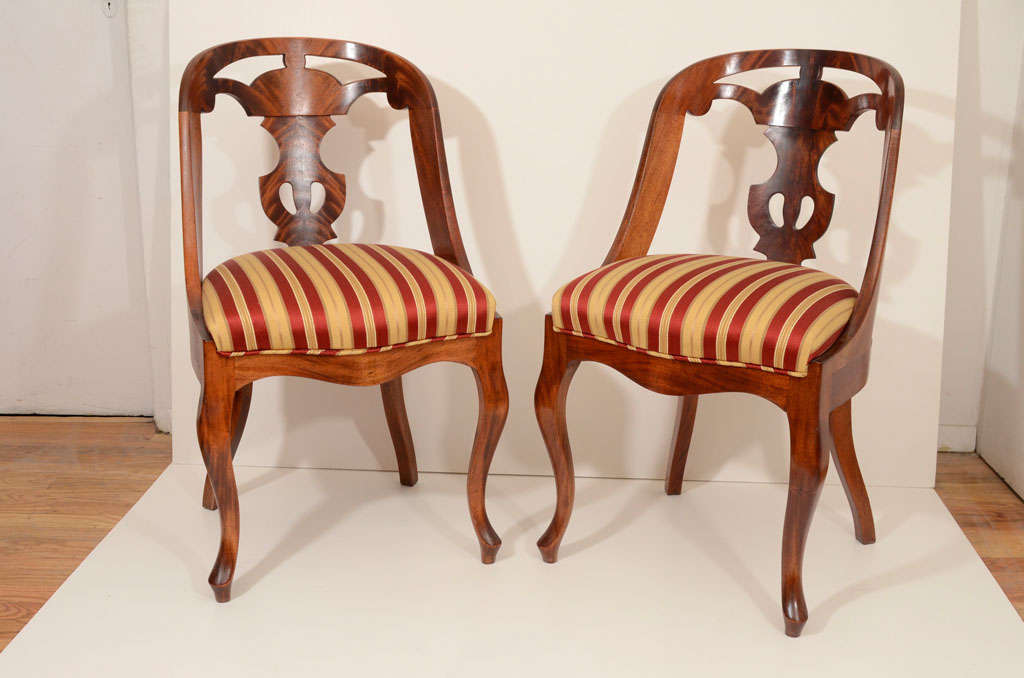 A dozen late Biedermeier, handmade neoclassical chairs of a design typical to Gothenburg, Sweden.