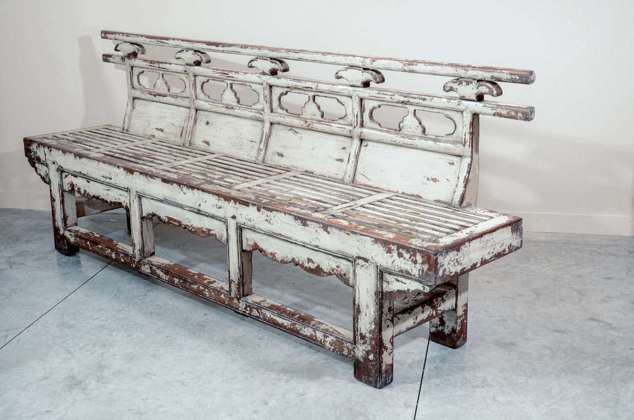 A very large early 20th century weathered theater bench from Shanxi Province, with traces of old white paint. An incredible piece with considerable presence.
a b h a y a
BN361.
  