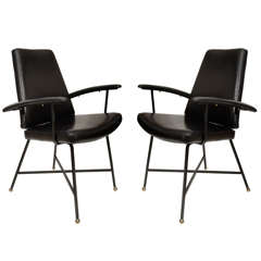 Pair of lacquered metal and leather armchairs by Jacques Quinet.