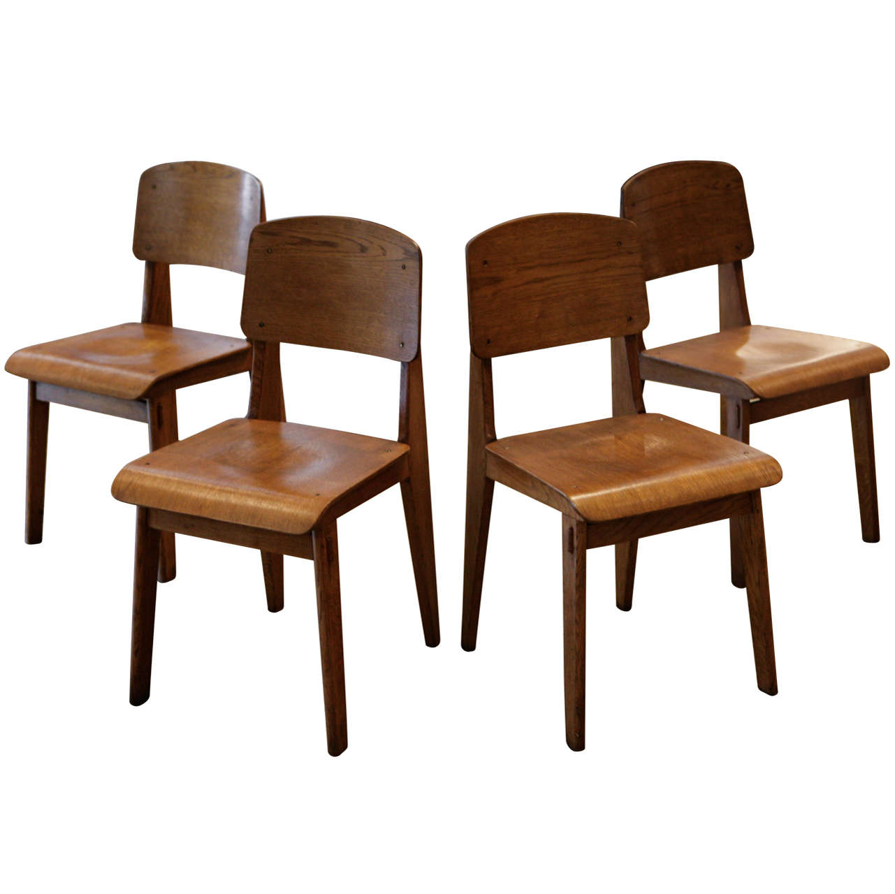 Jean Prouve, ensemble de 4 chaises Tout en Bois, vers 1941