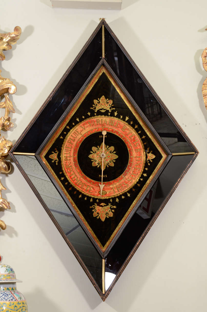 A fine Charles X 19th century diamond shape eglomise Barometer