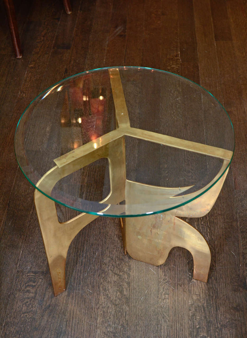 Bronze side table with free form base inspired by the mid century sculptural style. Glass top available in 1/4” polished edge bronze glass or 1/2” beveled tempered glass (as shown).
