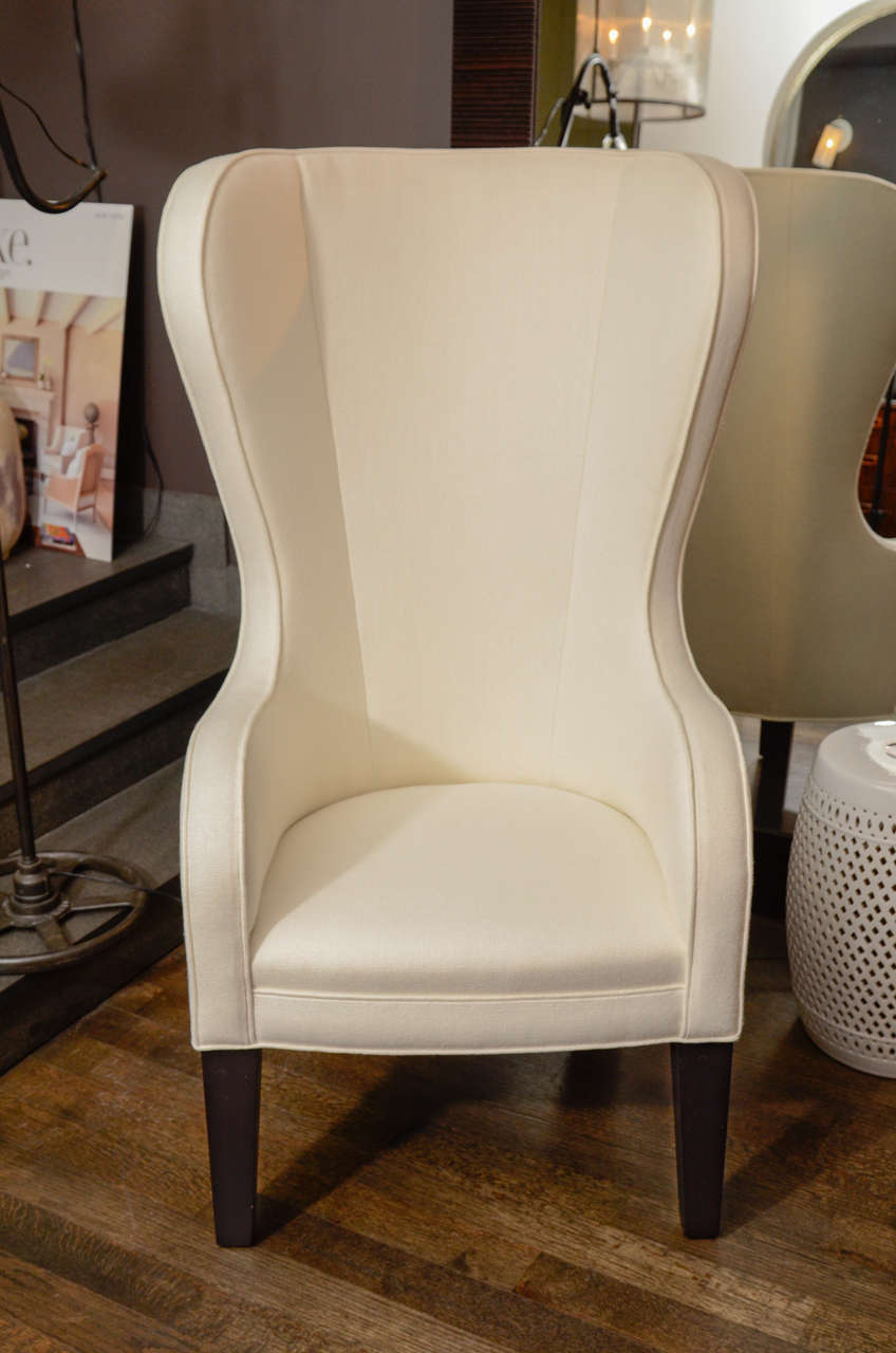 Hand-made wing chair made with hand-tied spring seat with horsehair fill cushion, solid maple structure and feet, cording trim details. Finishes available are natural, chocolate, white or ebonized.